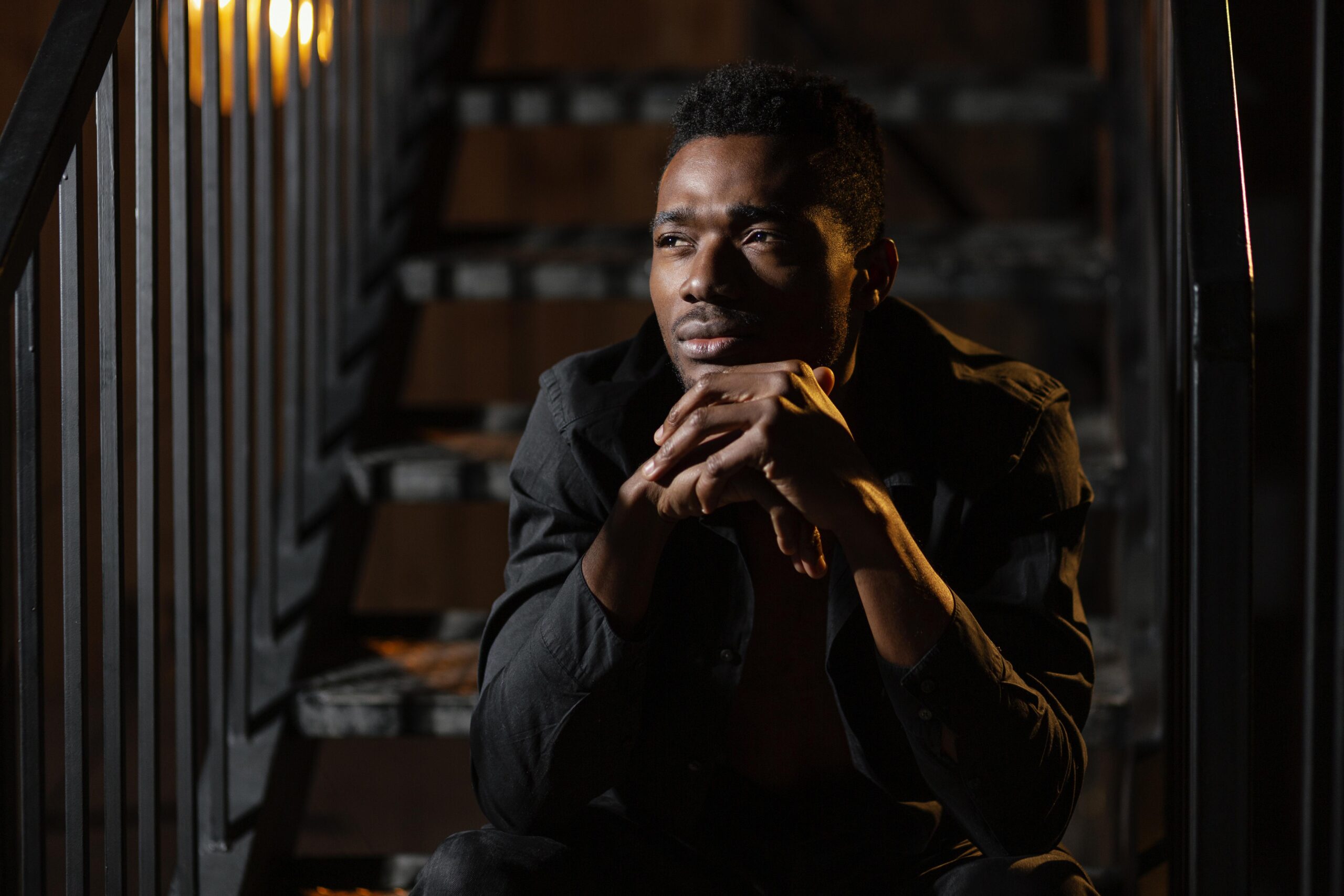 medium shot man stairs thinking scaled